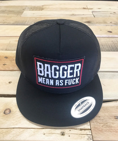 Black cap with 'Bagger Mean as Fuck' text on a wooden surface