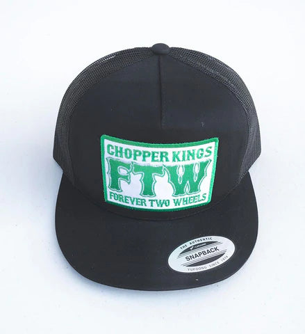 Black cap with green and white text on a white background