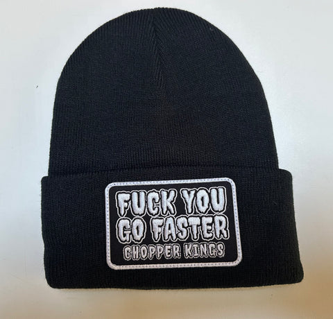 Black beanie with a text patch on a white background