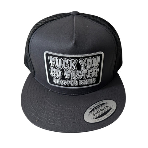 Black snapback cap with a graphic design on a white background