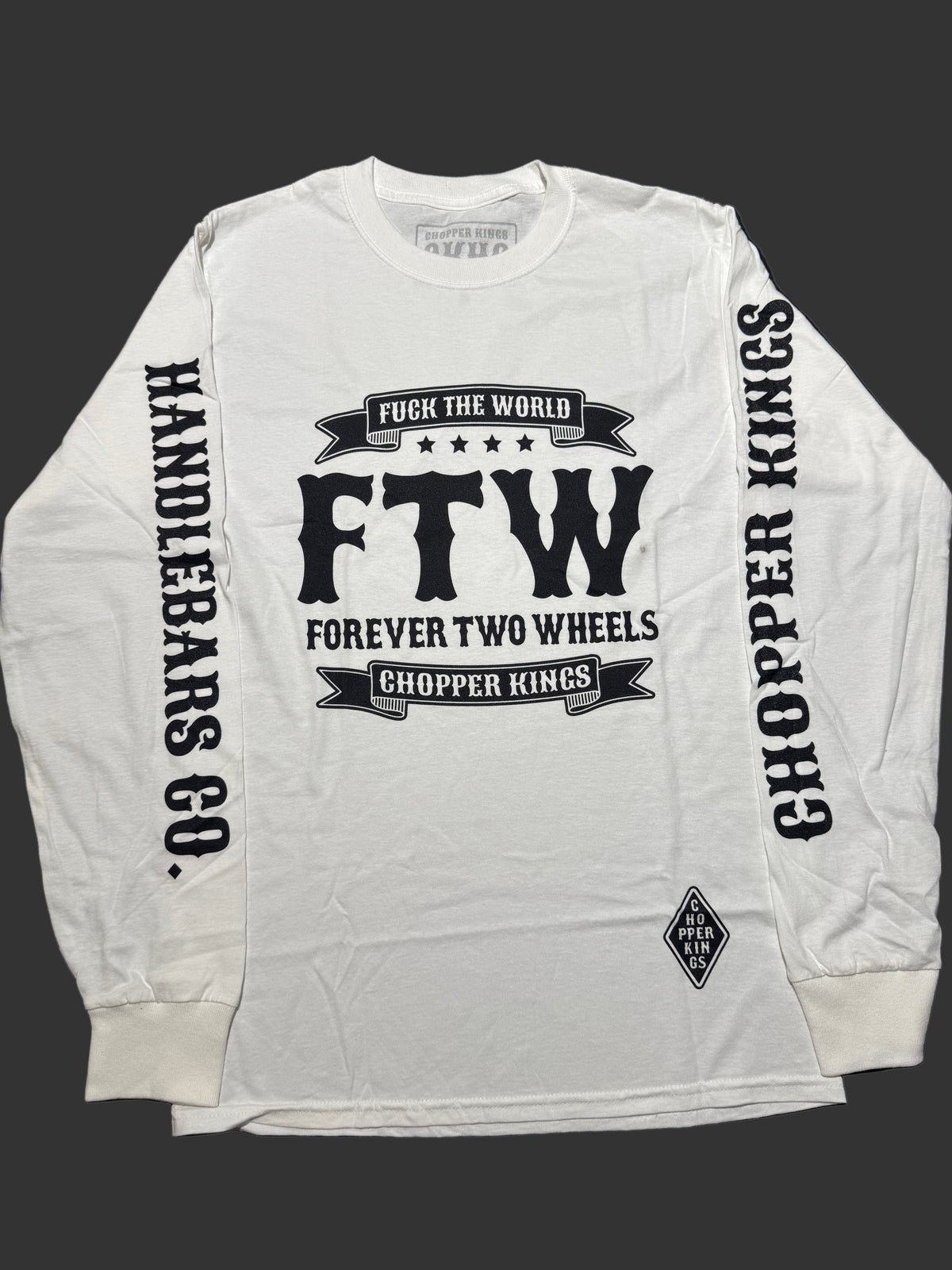 White long-sleeve shirt with black text and branding on a dark background