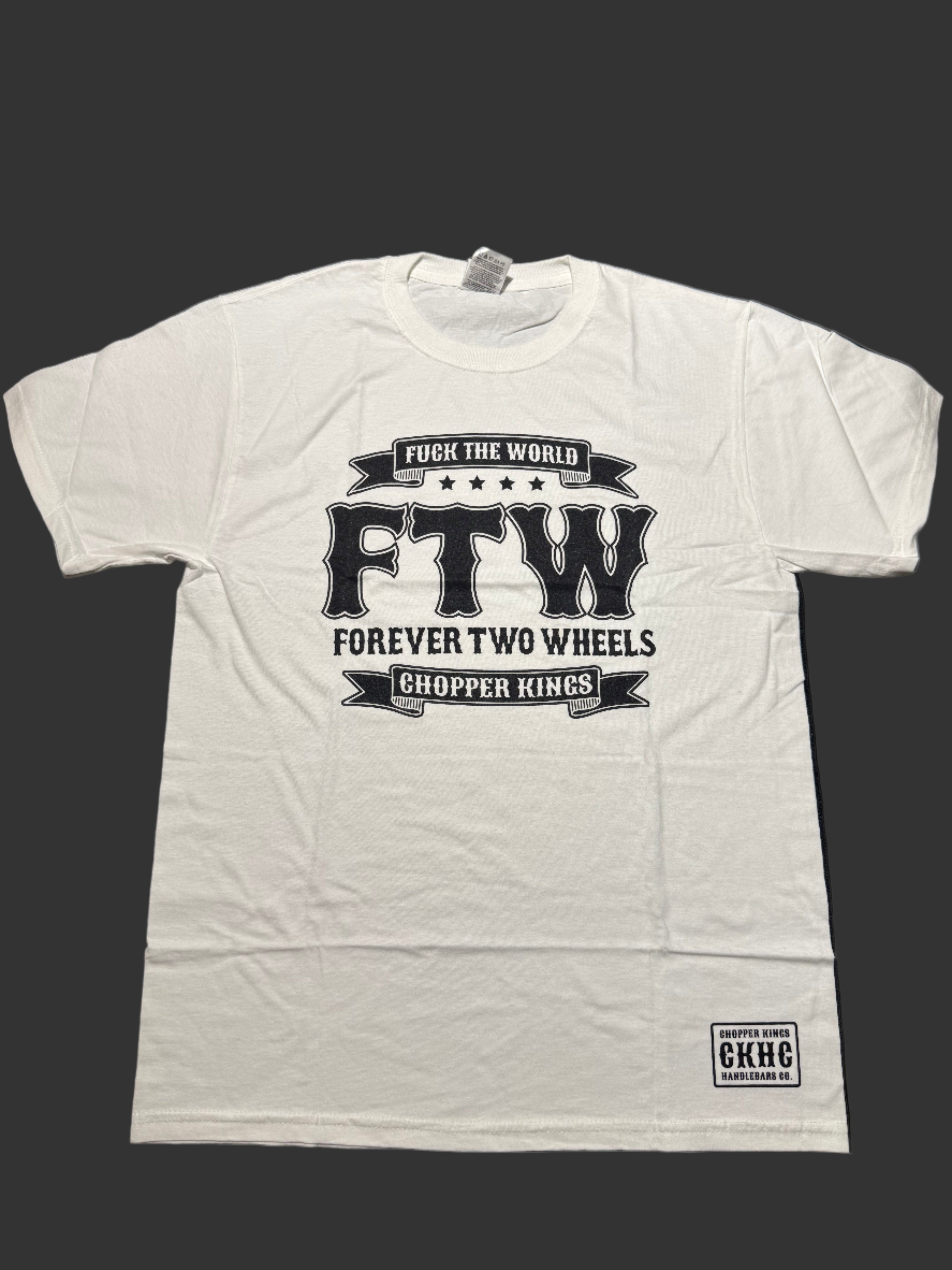 White t-shirt with black text and logo on a dark background