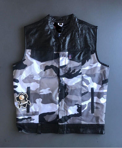 Camouflage vest with black accents on a gray background