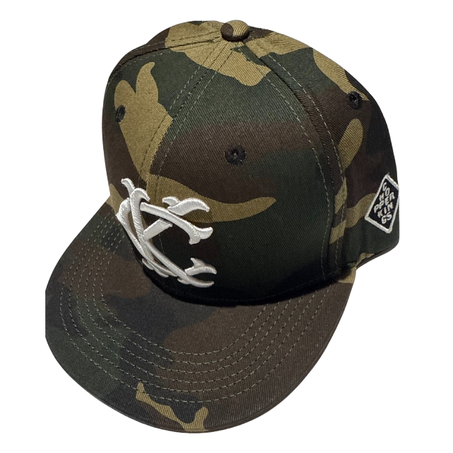 Camouflage baseball cap with white logo on a white background