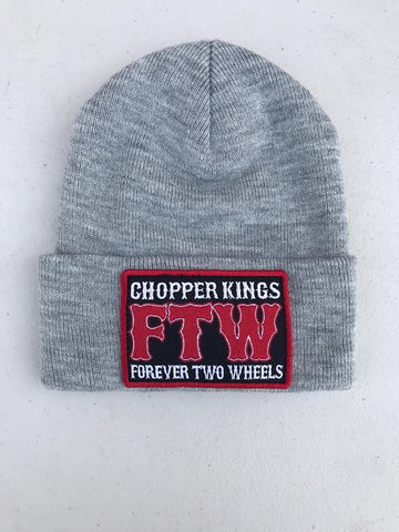 Gray beanie with a red and black patch on a white background