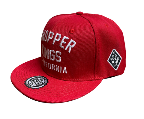 Red cap with white text and logos on a white background