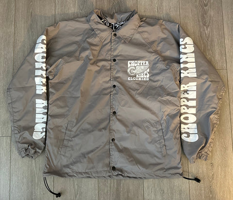 Brown jacket with 'Chopper Kings' branding on a wooden floor