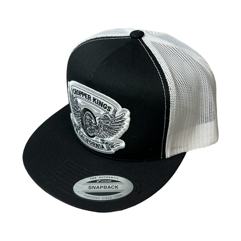 Black and white trucker cap with a logo on a white background